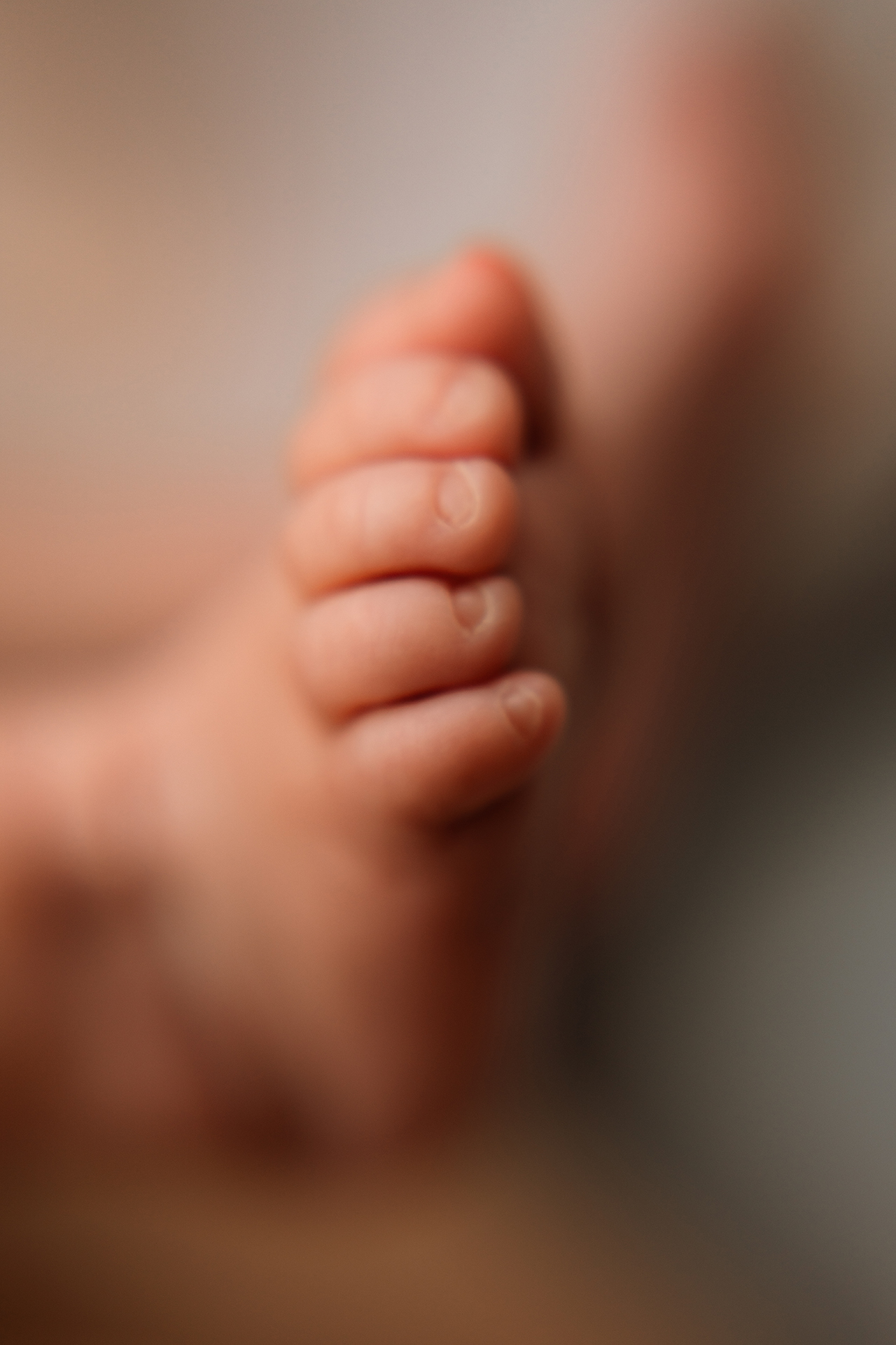 Detailfoto van voetjes tijdens een newbornshoot